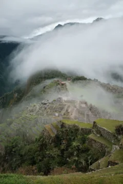 Views of a cloud covered Machu Picchu in Peru.