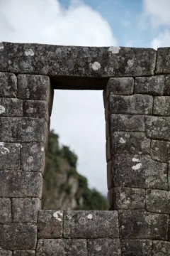 A stone window in a residential building at Machu Picchu, Peru.