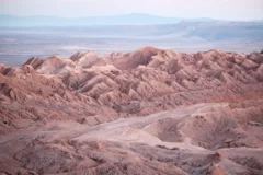 A photo of the unusual red rock formations that make up the Valley of the Moon in Chile.