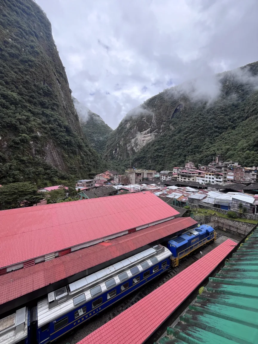 A PeruRail train at the Aguas Calientes (Machu Picchu Pueblo) train station.