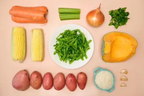 A photo of the ingredients needed to make a Chilean vegetable stew.