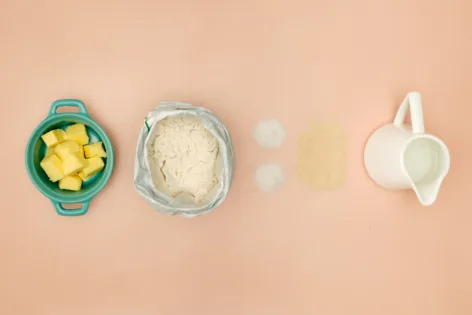 Flat lay of the  ingredients needed to make Chilean pan amasado (kneaded bread).