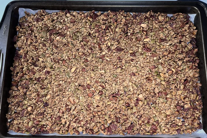 Toasted Maple Nut Granola on a baking tray.